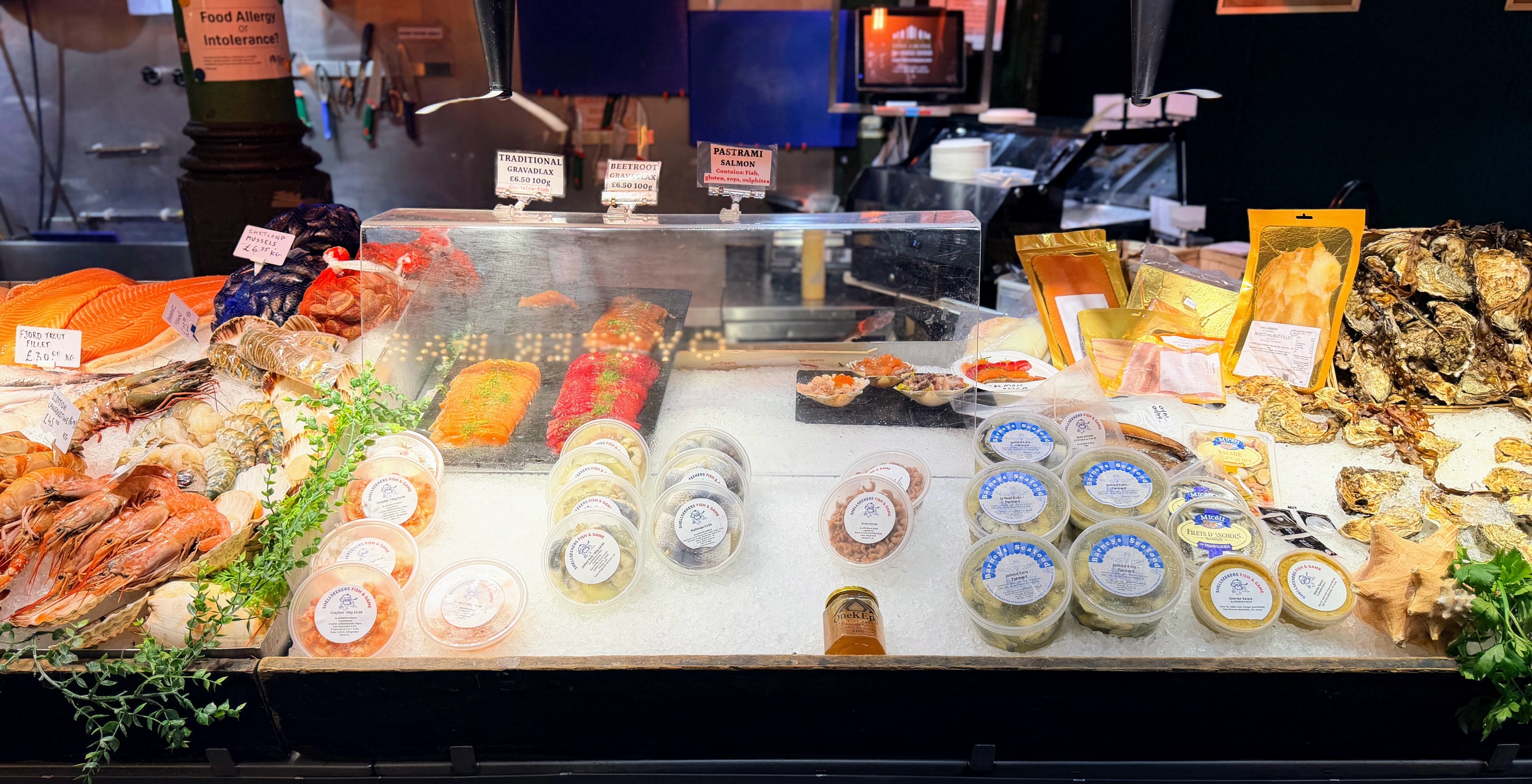 OneKEpp honey jar among fresh seafood at a Borough Market fish counter
