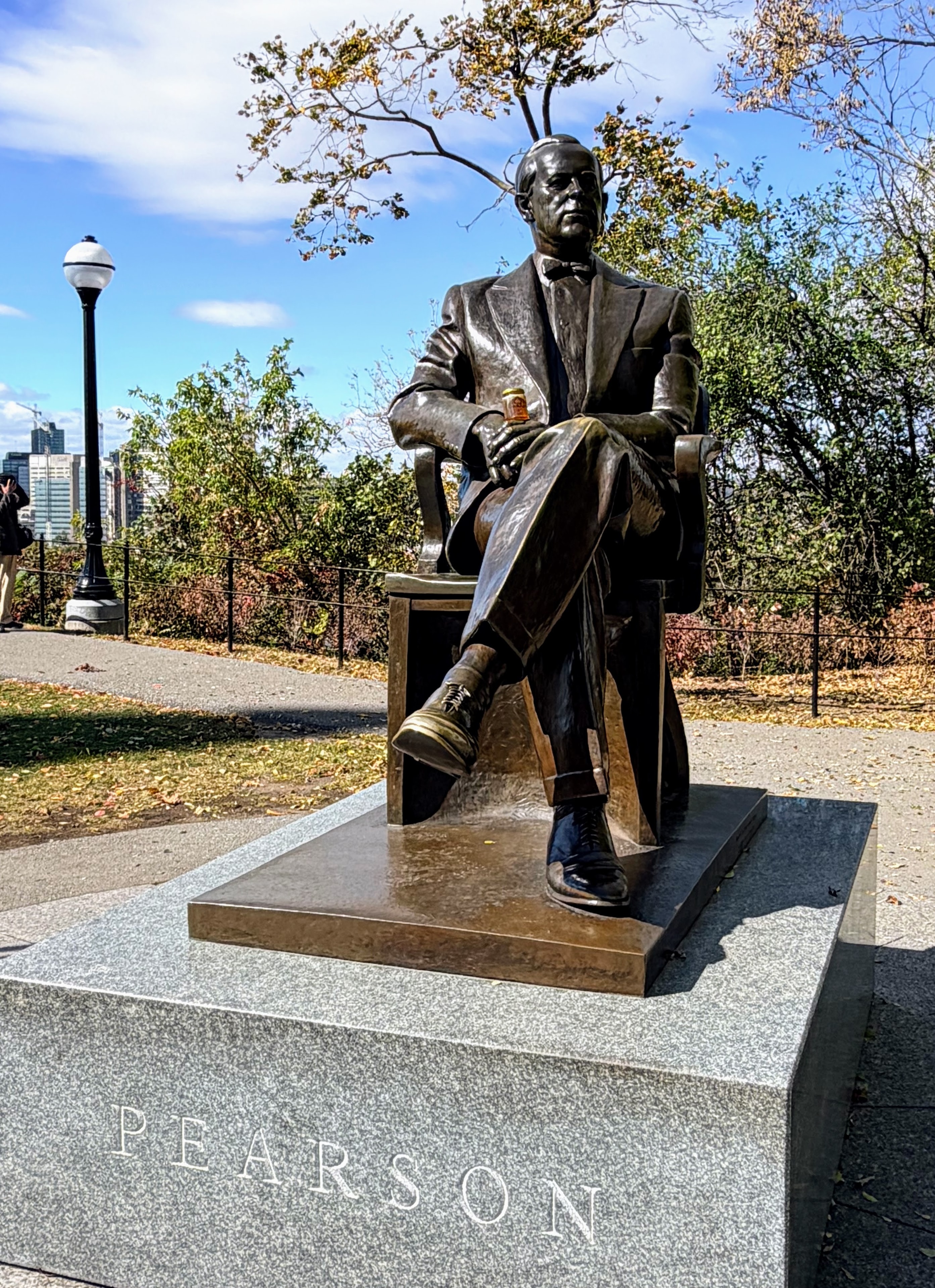 OneKEpp honey jar held by the Lester B. Pearson statue on Parliament Hill